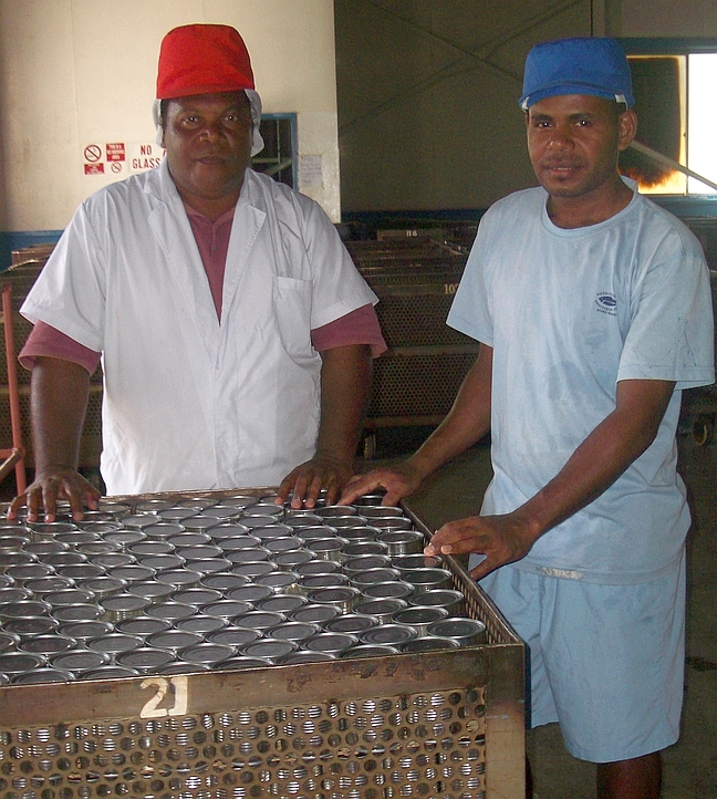 Workers inspect new cans for tuna at Solomon Islands cannery, c 2009. Photo: Amanda Hamilton. Soltai-003-sm-AH